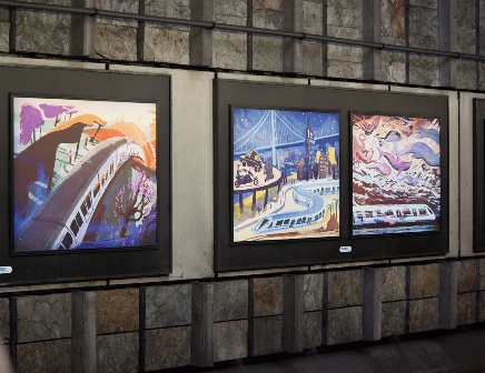Image of the three art posters by the artist; feature a train wondering through hills, cliff escape, and bay. 